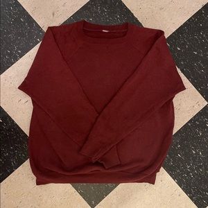 Women’s red sweater.